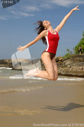 Image of Young woman exercising