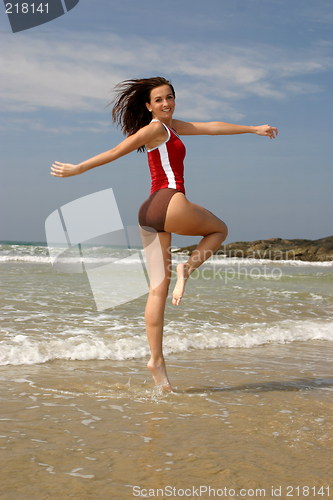 Image of Young woman exercising