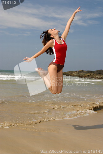 Image of Young woman exercising