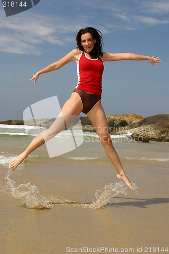 Image of Young woman exercising