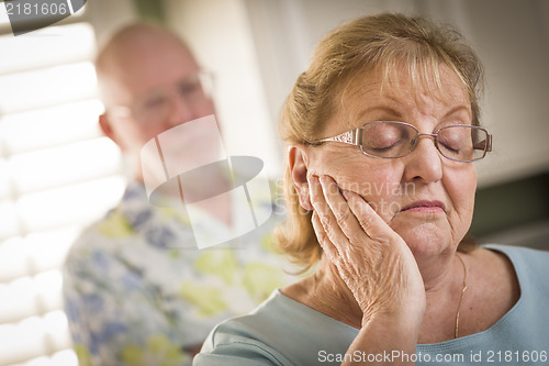 Image of Senior Adult Couple in Dispute or Consoling