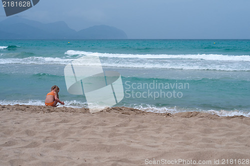 Image of Blue sea and sand on the beach