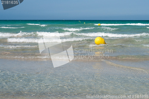 Image of Yellow buoy in the sea