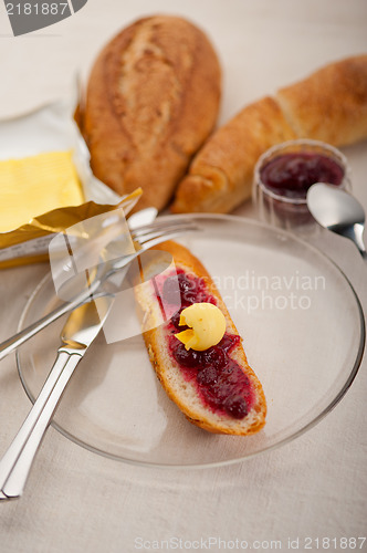 Image of bread butter and jam 