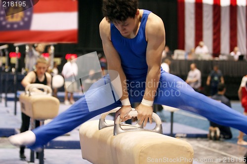 Image of Boy competing on pommel