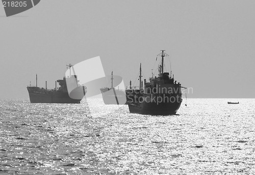 Image of Three small oil tanker at anchor