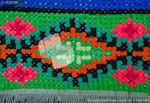 Image of embroidered good by cross-stitch pattern