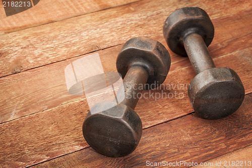 Image of vintage iron dumbbells