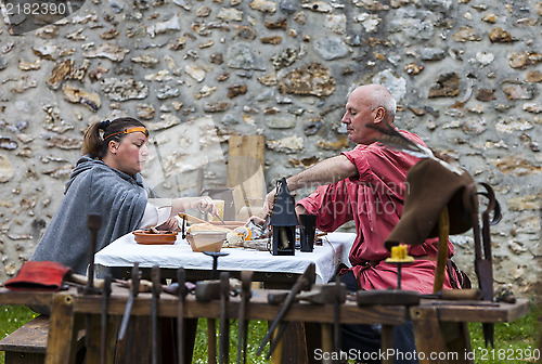 Image of Medieval Couple Having the Lunch