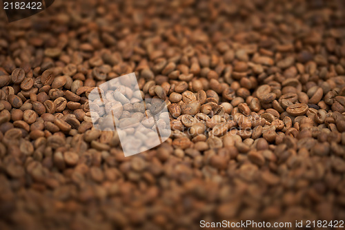 Image of Fresh fried coffee beans close-up