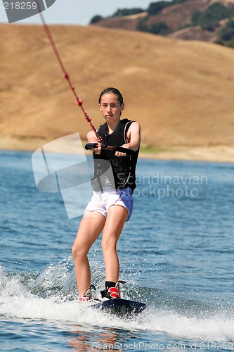 Image of Girl wakeboarding