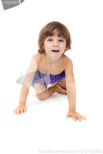 Image of Little girl crawling on the floor