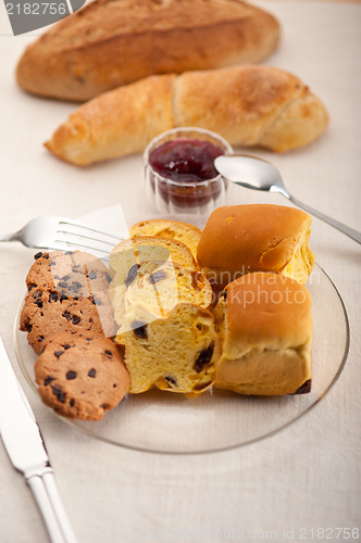 Image of bread butter and jam 