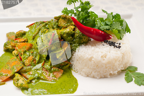 Image of chicken with green curry vegetables and rice