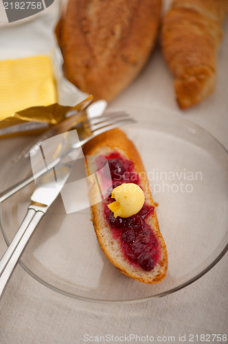Image of bread butter and jam 