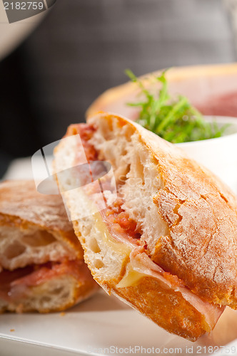 Image of ciabatta panini sandwich with parma ham and tomato