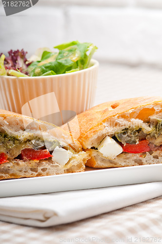 Image of ciabatta panini sandwichwith vegetable and feta