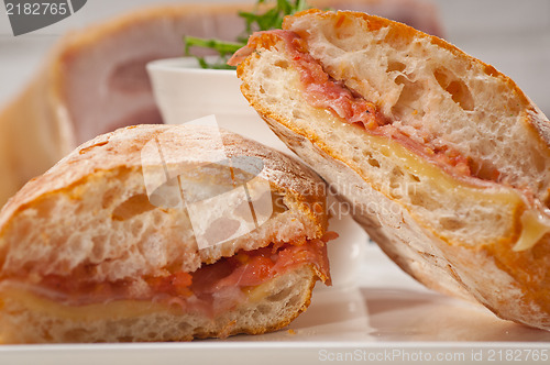 Image of ciabatta panini sandwich with parma ham and tomato