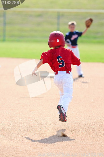 Image of Baseball player running to second base
