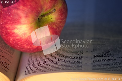Image of Aplle on a book, education concept