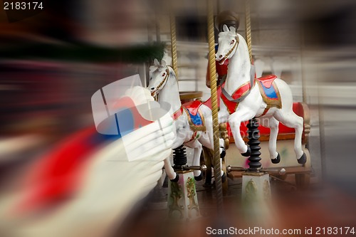 Image of Vintage carousel in motion