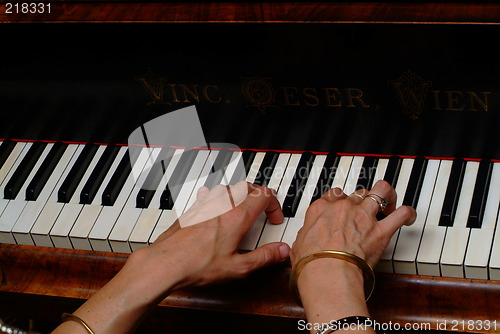 Image of piano playing