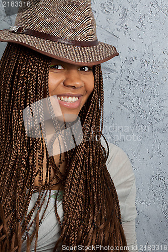 Image of young woman with African braids