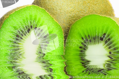 Image of Kiwi on white background with water reflection