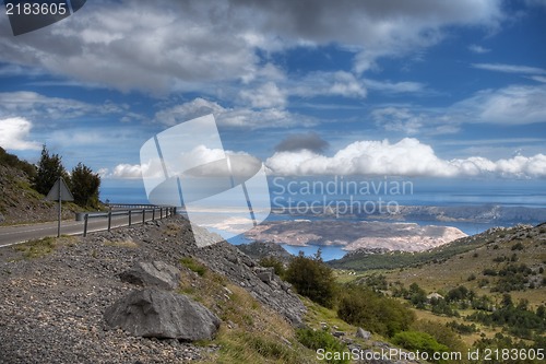 Image of Road on a mountain on a cloudy summer day