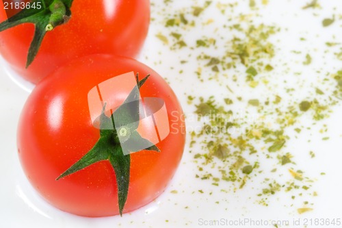 Image of Spicy milky cheese soup with small red tomatoes