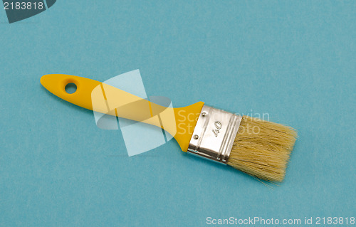 Image of brush 40mm wide yellow shaft handle paint blue 