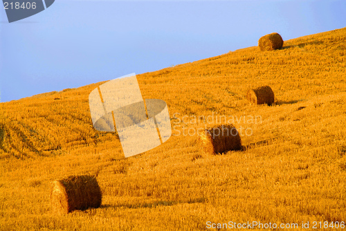 Image of four hay balls