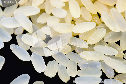 Image of Rice  on black background close up