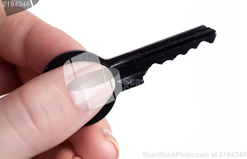 Image of Hand holding key