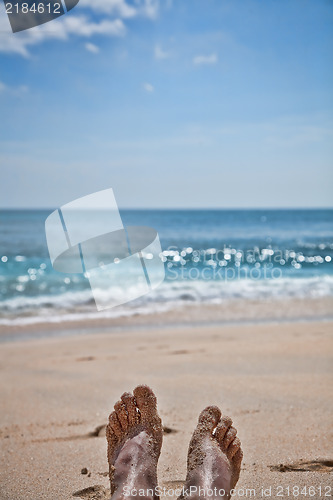 Image of Feet on a sand beach