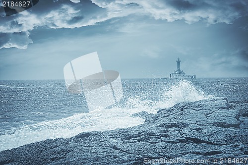 Image of Lighthouse on a stormy day, artistic toned photo