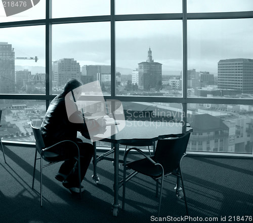 Image of Man reading a book