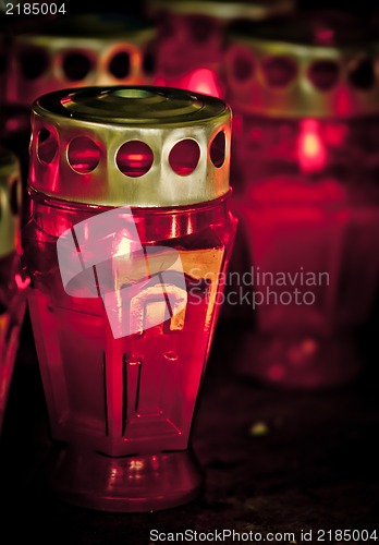 Image of Deceased holiday. Candles on dark background.