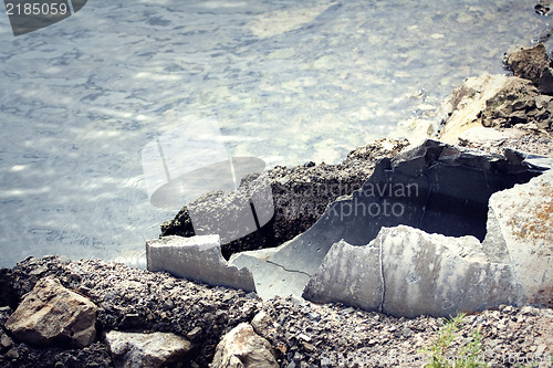 Image of Old pipes with wastewater going into the sea