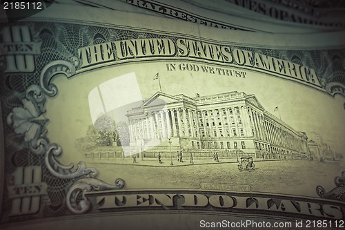 Image of US dollars background, retro style toned photo