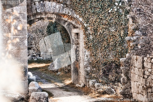 Image of Old castle backyard with stone arches