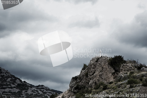 Image of Cross on the top of the mountain