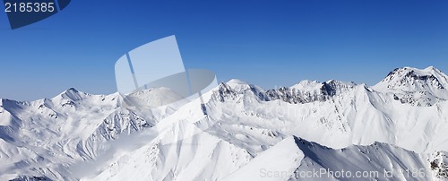 Image of Panorama of snow mountains and blue sky