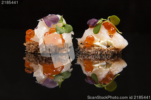 Image of Salmon, cheese, and herbs canapes