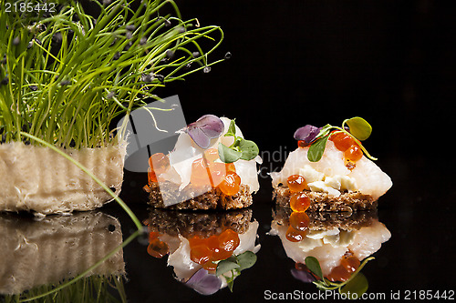 Image of Salmon, cheese, and herbs canapes