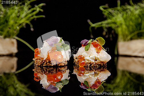 Image of fresh salmon, cheese, and herbs canapes