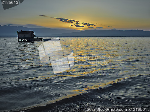 Image of Old fishing cottage in the dawn