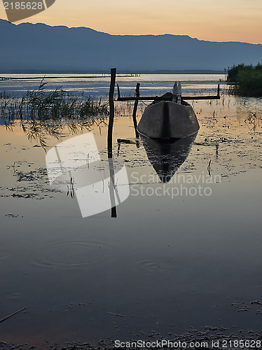 Image of Fishing boat at dawn