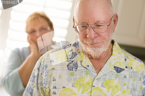 Image of Senior Adult Couple in Dispute or Consoling