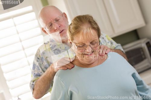 Image of Senior Adult Husband Giving Wife a Shoulder Rub